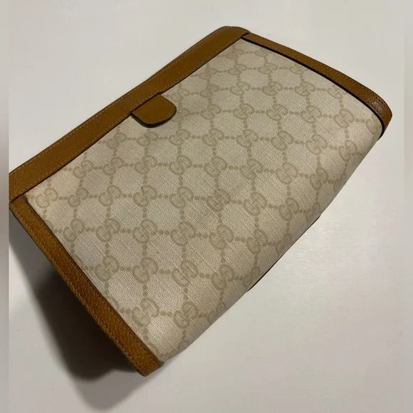 Gucci pvc/leather clutch